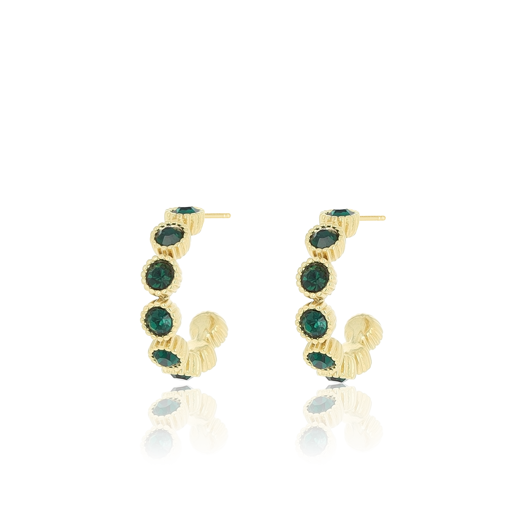 Gold coloured earrings with green stones